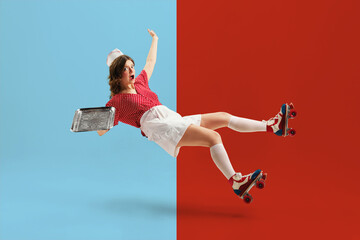 Portrait of young beautiful girl, woman wearing retro style clothes and rollers falling with shocked facial expression. Waitress in cafe. Trash pop art