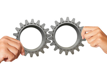 Business  people connect two pieces of gears as partnership, teamwork and integration concept