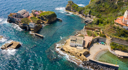 Aerial view of the Gaiola beach and island located in the Posillipo district, in Naples, Italy. The...