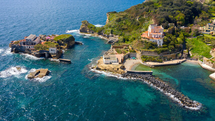Aerial view of the Gaiola beach and island located in the Posillipo district, in Naples, Italy. The...