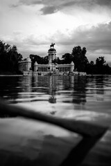 Vertical distant view of the El Retiro Park in black and white in Madrid, Spain