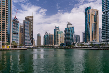 Panorama of apartment blocks surround the water at Dubai Marina in the UAE