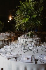 Interior of a restaurant decorated with flowers for a wedding celebration ceremony