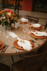 Interior of a restaurant decorated with flowers for a wedding celebration ceremony