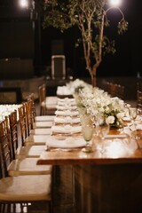 Interior of a restaurant decorated with flowers for a wedding celebration ceremony