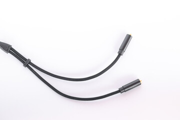 Headphone and microphone splitter cable for connecting a smartphone.