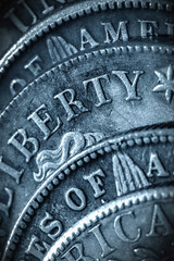 Obraz premium Old US coins with inscription: Liberty as symbol: America is the land of opportunities and freedom. Vertical image.