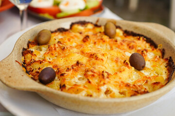 Bacalhau com Natas, most famous Portuguese dishes made with salted cod served in a mixture of...