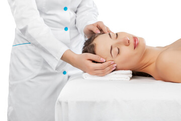 Fototapeta na wymiar Beautiful Young Woman Getting Head Massage