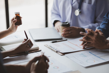 Conference room in the hospital, a group of doctors attending a meeting of drug presentations, a meeting of executive doctors and chiefs meeting with drug dealers. Doctor meeting concept.