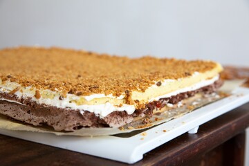Closeup of a homemade cake with crumbs on the top