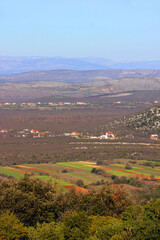 Fototapeta na wymiar Agricultural fields in village Vrana, south Croatia. early spring, aerial view.