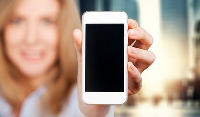 Happy young business woman hold smartphone