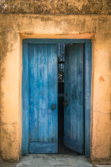 Fototapeta na wymiar Colorful old door from the former prison on Prison Island (Changuu Island) Zanzibar Tanzania Africa