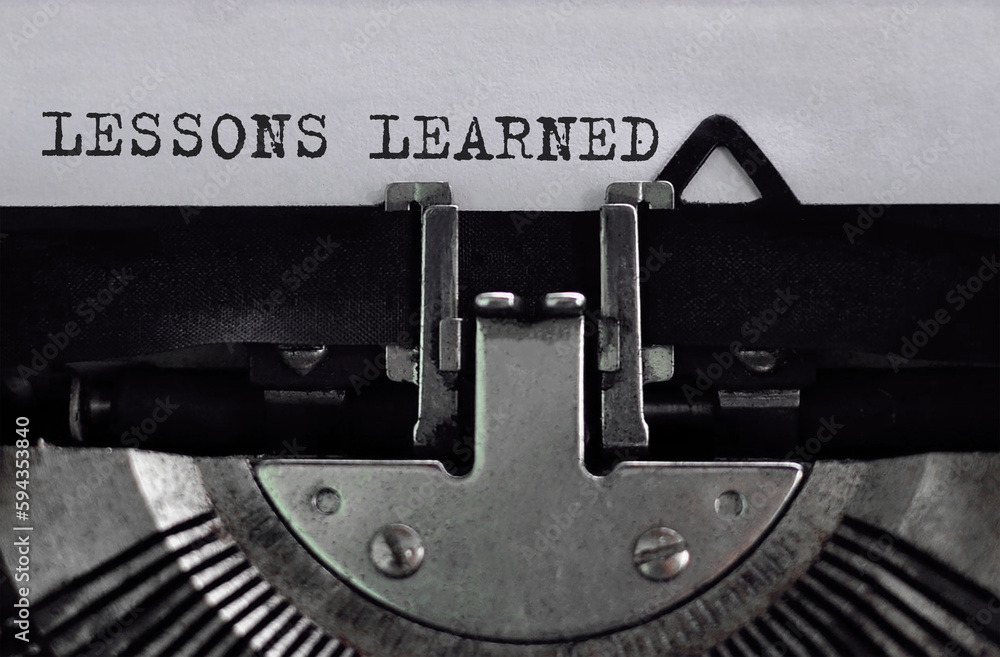 Poster text lessons learned typed on retro typewriter