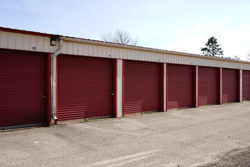 Fototapeta na wymiar Red storage unit buildings holding owner's property.