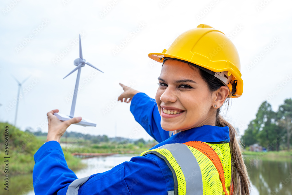Poster engineer working at the natural energy wind turbine site,wind turbine operations that transform wind