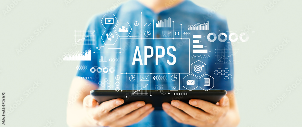 Aufkleber apps theme with young man using a tablet computer