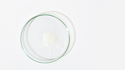 White powder in a Petri dish. Cocaine, cannabinoid, medicinal powder, antibiotic. lab, research.