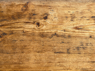 Wooden background with traces of antiquity close-up