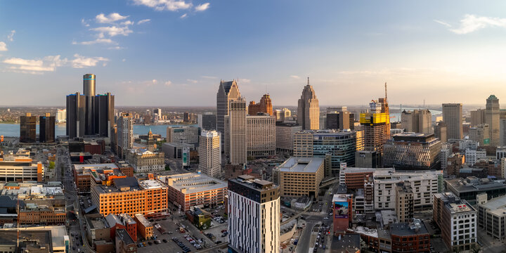 Aerial view of Detroit downtown under evening sunlight. Second biggest metropolitan area in American mid west.