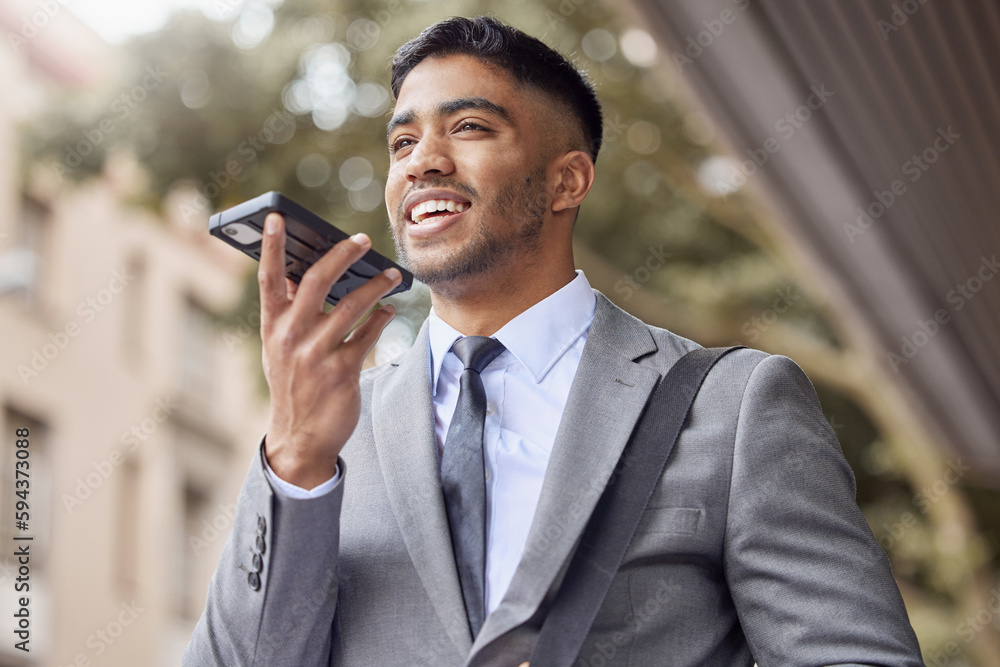 Poster i prefer to send voice notes. a handsome young businessman walking through the city and using his ce