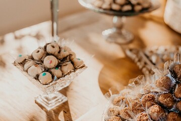 Closeup of a festive table with a pile of sweets during the ceremony