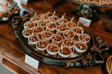 Closeup of a festive table with a pile of sweets during the ceremony