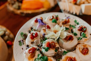 Closeup of a festive table with a pile of sweets during the ceremony