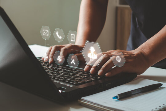 IT support, Technical support customer service concept, User hand using computer laptop with VR screen support customer icon, Technology internet concept, call center and customer service help 24 hrs.