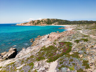 Beautiful aerial photo landscape of a white sand beach in Northern Sardegna, Italy, Europe