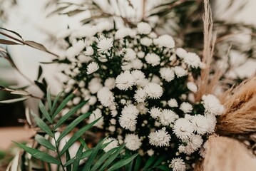 Closeup of floral decorations and bouquets on the table for a wedding celebration