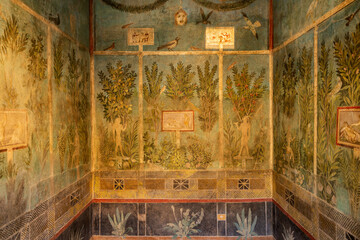 Ancient fresco on a wall of villa in Pompeii archaeological park near Naples city, Italy
