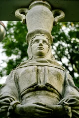 Zelfklevend Fotobehang Historisch monument Old statue in a park in Bucharest, Romania