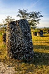 Plain of Jars, a megalithic archaeological landscape in Laos. Xieng Khouang at golden hour.