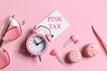 pink tax concept. watches, glasses, hairpins, pen and macaroons in pink colors. copy space. items...