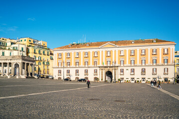 Fototapeta na wymiar The Palazzo della Prefettura or Palace of the Prefecture is a monumental palace located in the central Piazza del Plebiscito in Naples