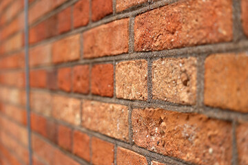 Mur z czerwonej cegły z równych prostokątów. Ściana.  - obrazy, fototapety, plakaty