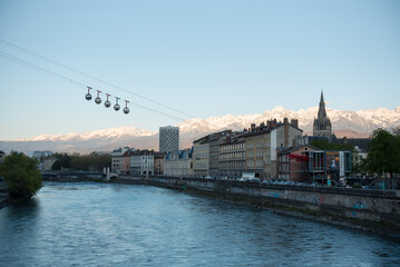 view of the river and the bridge in Grenoble France