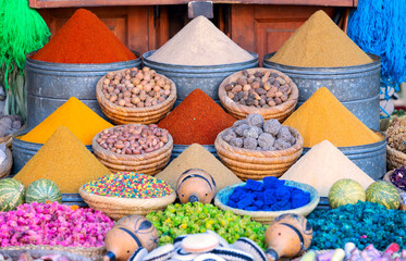 many colorful spices on a street shop in marrakech, morocco