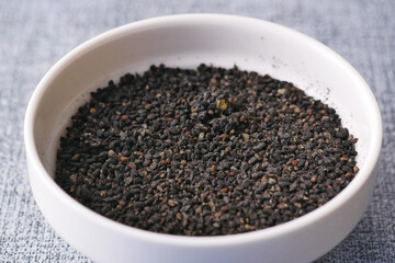 Black Cumin seed in a bowl on table 