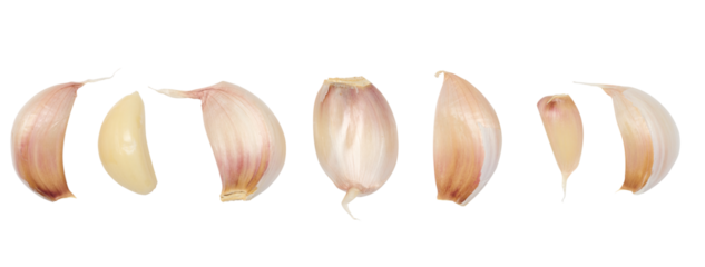 Peeled and unpeeled garlic on a white isolated background