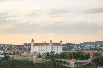 Fototapeta premium Beautiful view of the Bratislava castle on the banks of the Danube in the old town of Bratislava, Slovakia on a sunny summer day