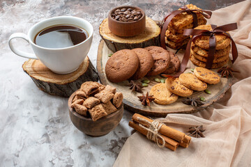 front view tasty sweet biscuits with cup of coffee on the light background color cocoa sugar tea cake cookie sweet pie