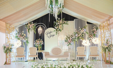 aisle decoration for a wedding complete with chairs and flower decorations