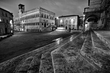 Fototapeta na wymiar Italy, Umbria, Perugia. Palazzo dei Priori and the Fontana Maggiore, a medieval fountain on Piazza IV Novembre.