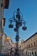 Fototapeta na wymiar Italy, Umbria. Wrought iron lamppost in the town of Perugia.