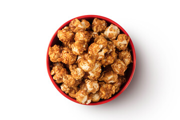 Blow of Caramel popcorn on white background. Top view
