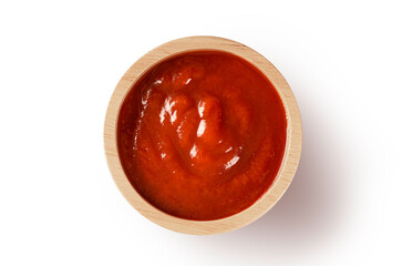 Bowl with red sauce isolated on white background.