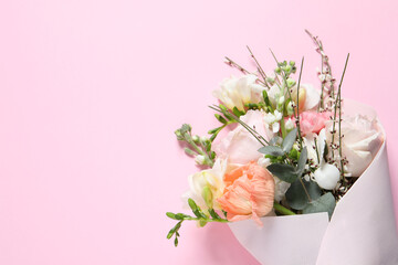 Bouquet of beautiful flowers on pink background, top view. Space for text